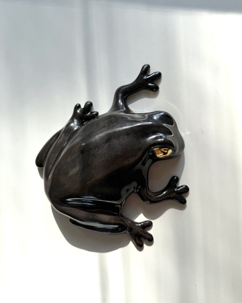 The Frog -wall sculpture, Black, Golden eyes