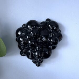 About to Burst -wall sculpture