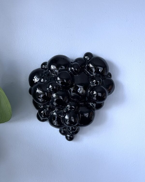 About to Burst -wall sculpture