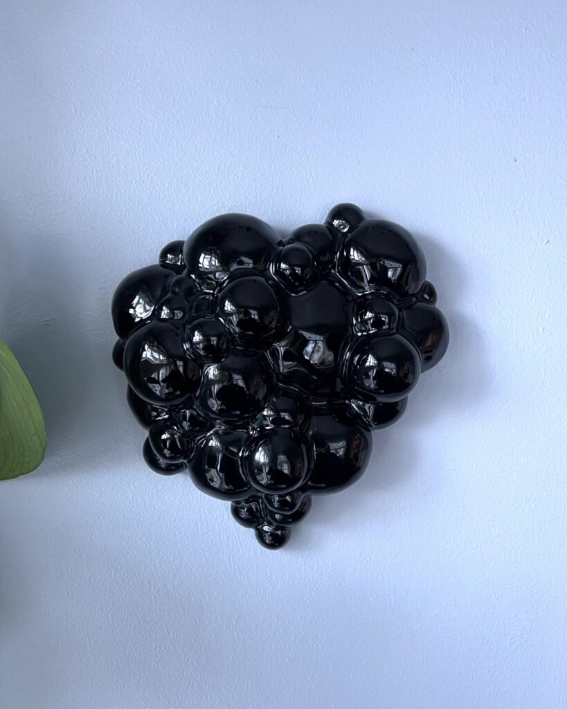 About to Burst -wall sculpture