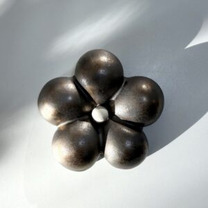 Flower -wall sculpture golden bronze