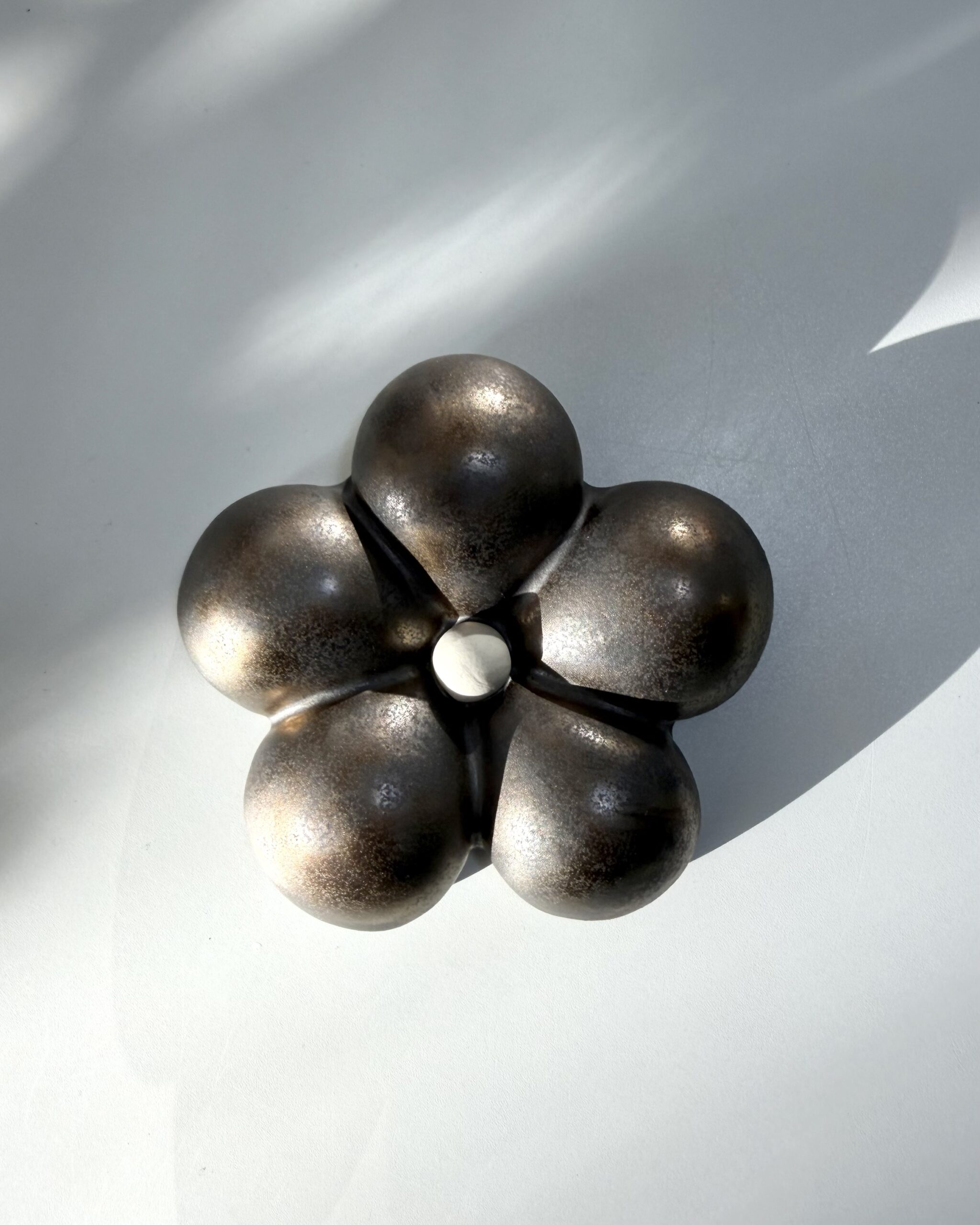 Flower -wall sculpture golden bronze